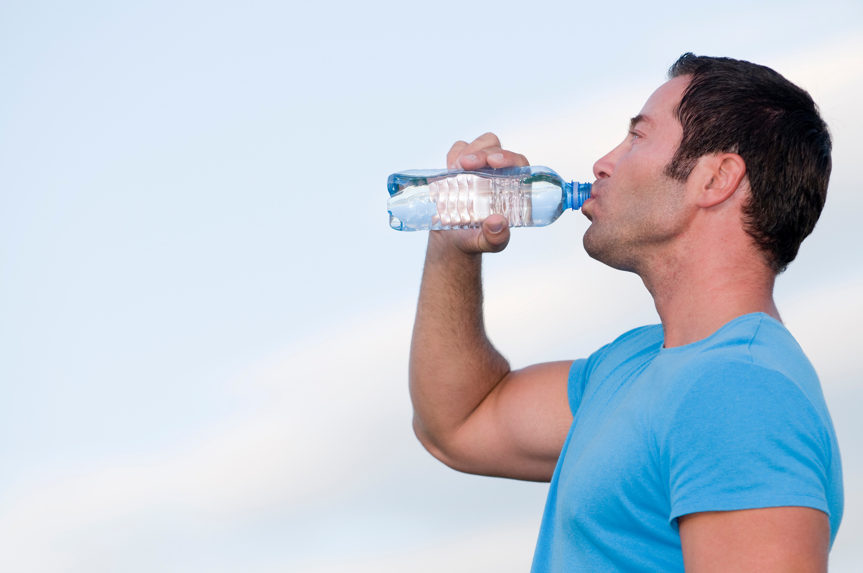 man drinking water